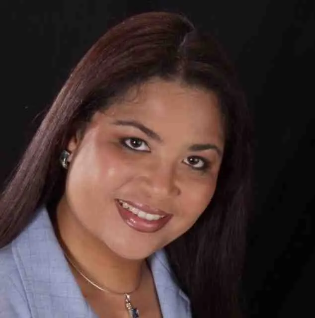 Woman poses for the camera wearing business atire