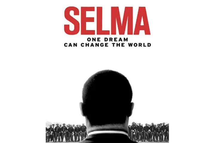 Flyer for movie reads Selma in big, bold red letters with subtitle that reads one dream can change the world
