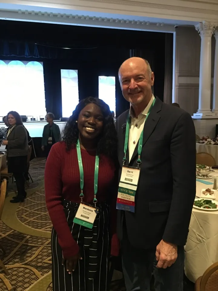Mardwina Lasseur poses with J. David Armstrong, Jr.